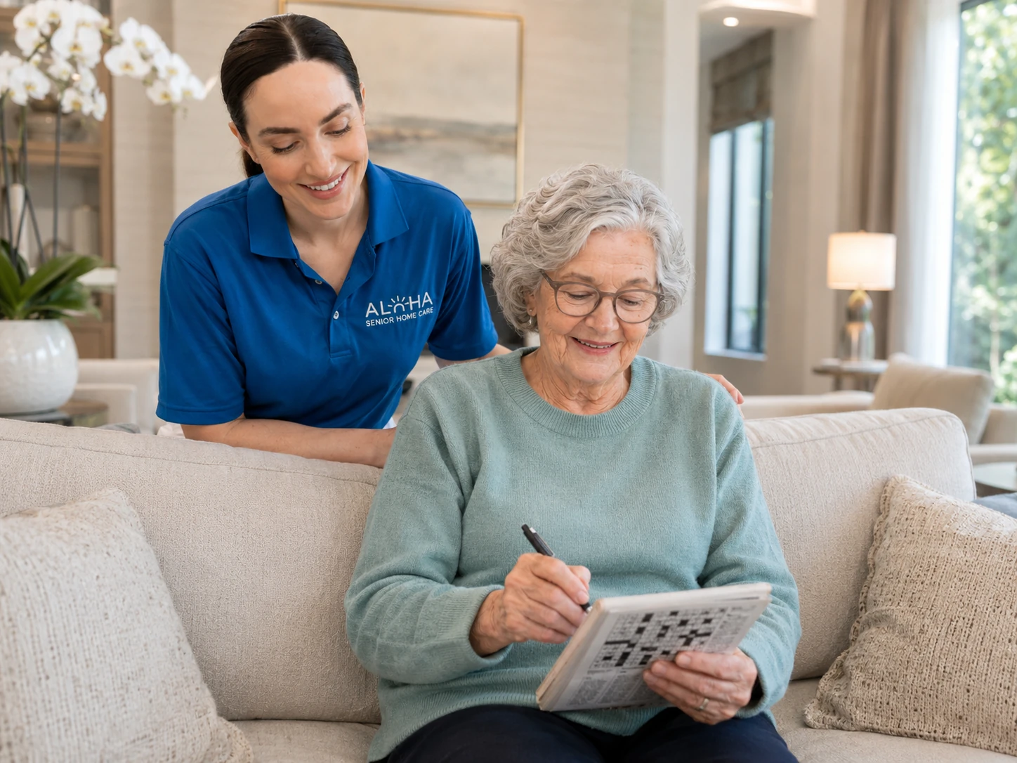 An Aloha caregiver with a senior client at home in San Diego